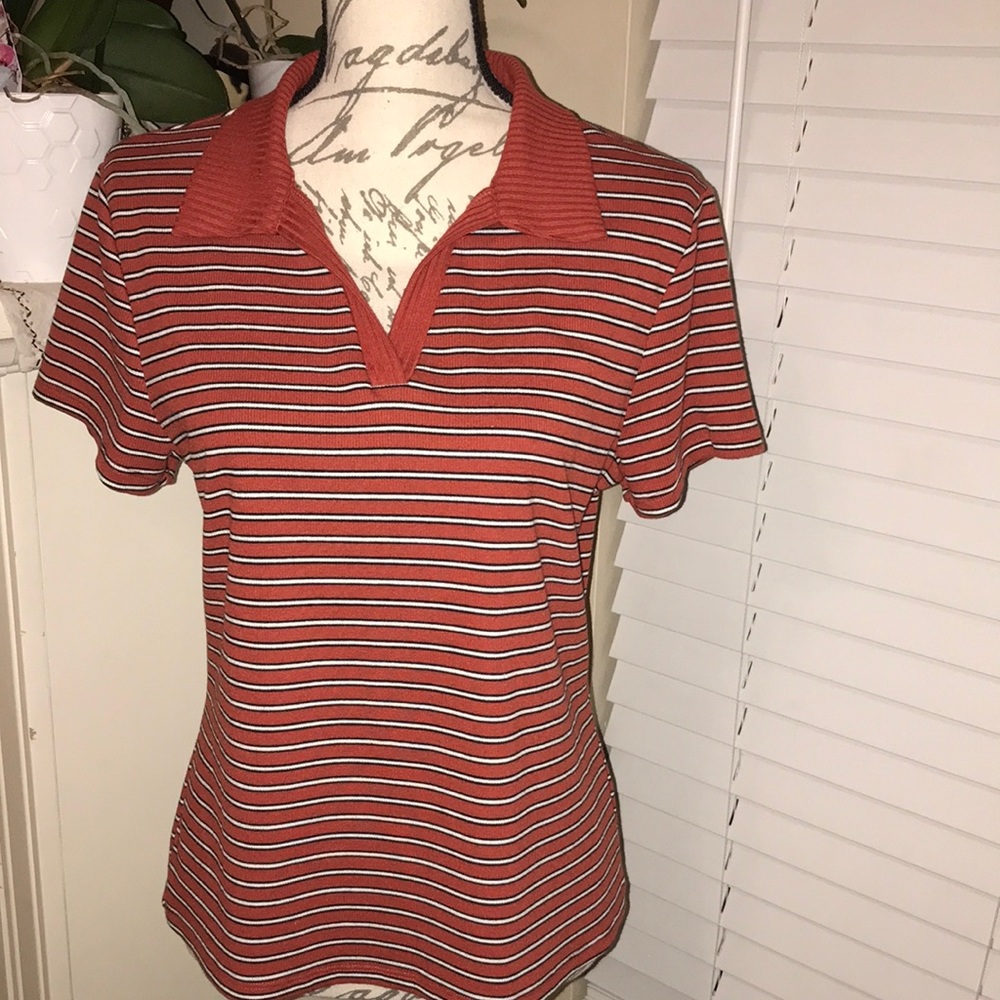Top open V neck. In perfect condition. Size XL